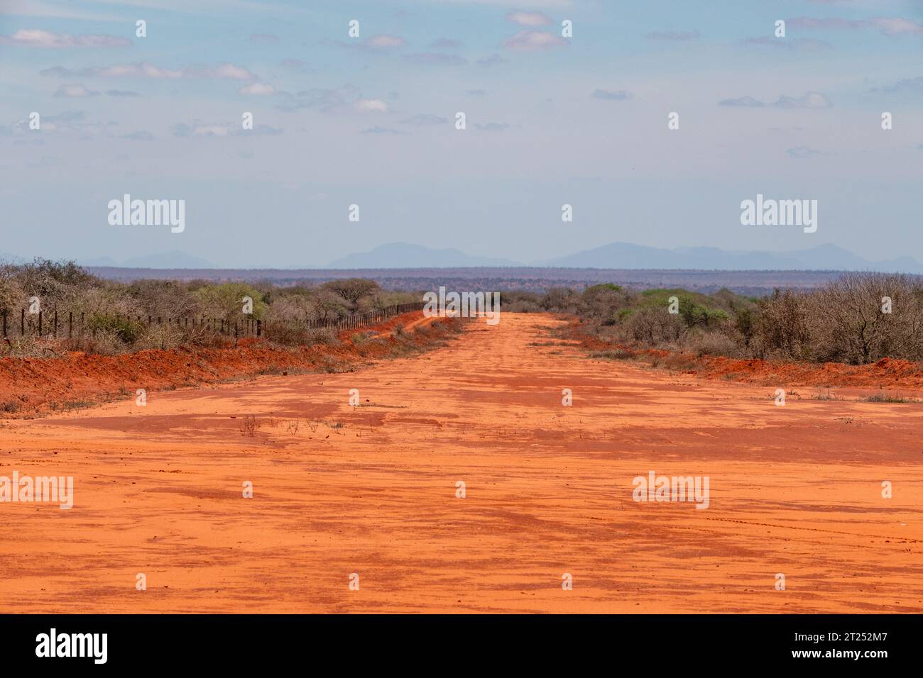 A dirt road airstrip in the wild at Tsavo East National Park in Kenya Stock Photo