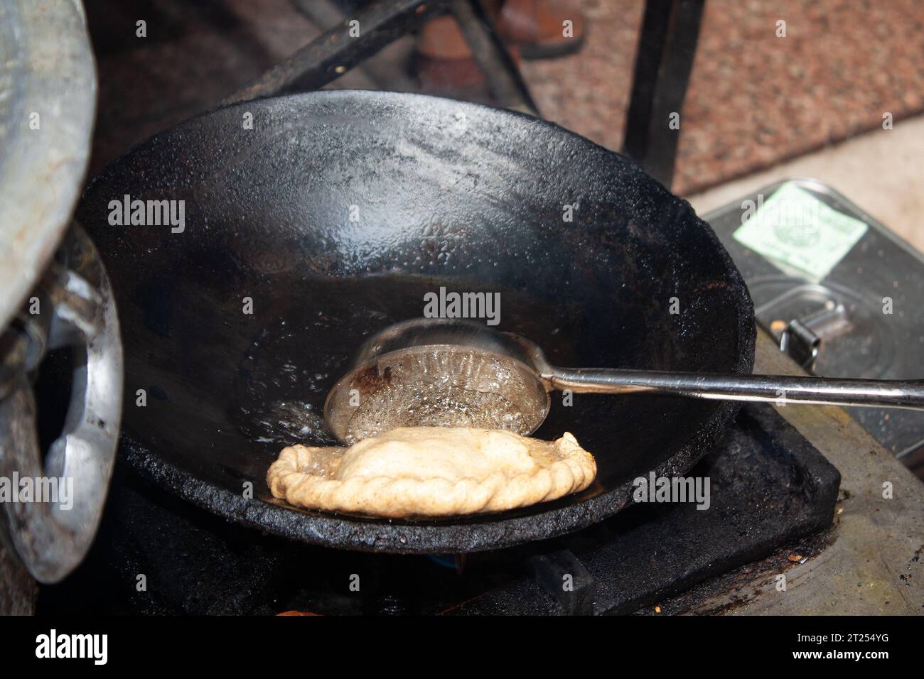 Close-up of a street vendor cooking street food, Old Delhi, India Stock