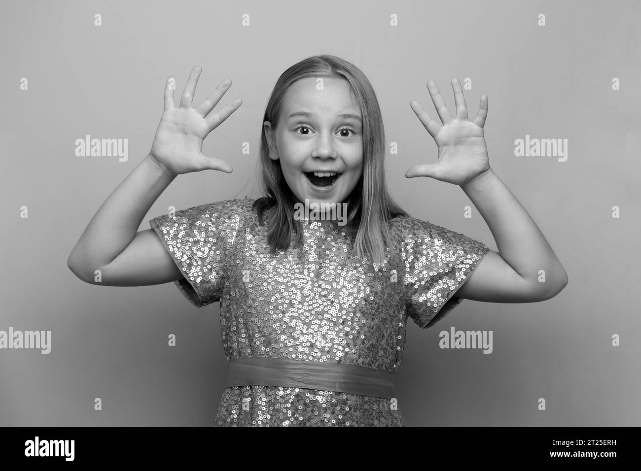 Happy surprised shocked excited child girl, black and white photo Stock Photo