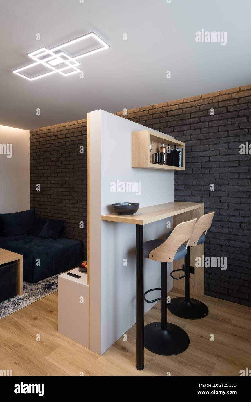 Compact bar counter or dining area in small urban apartment Stock Photo ...