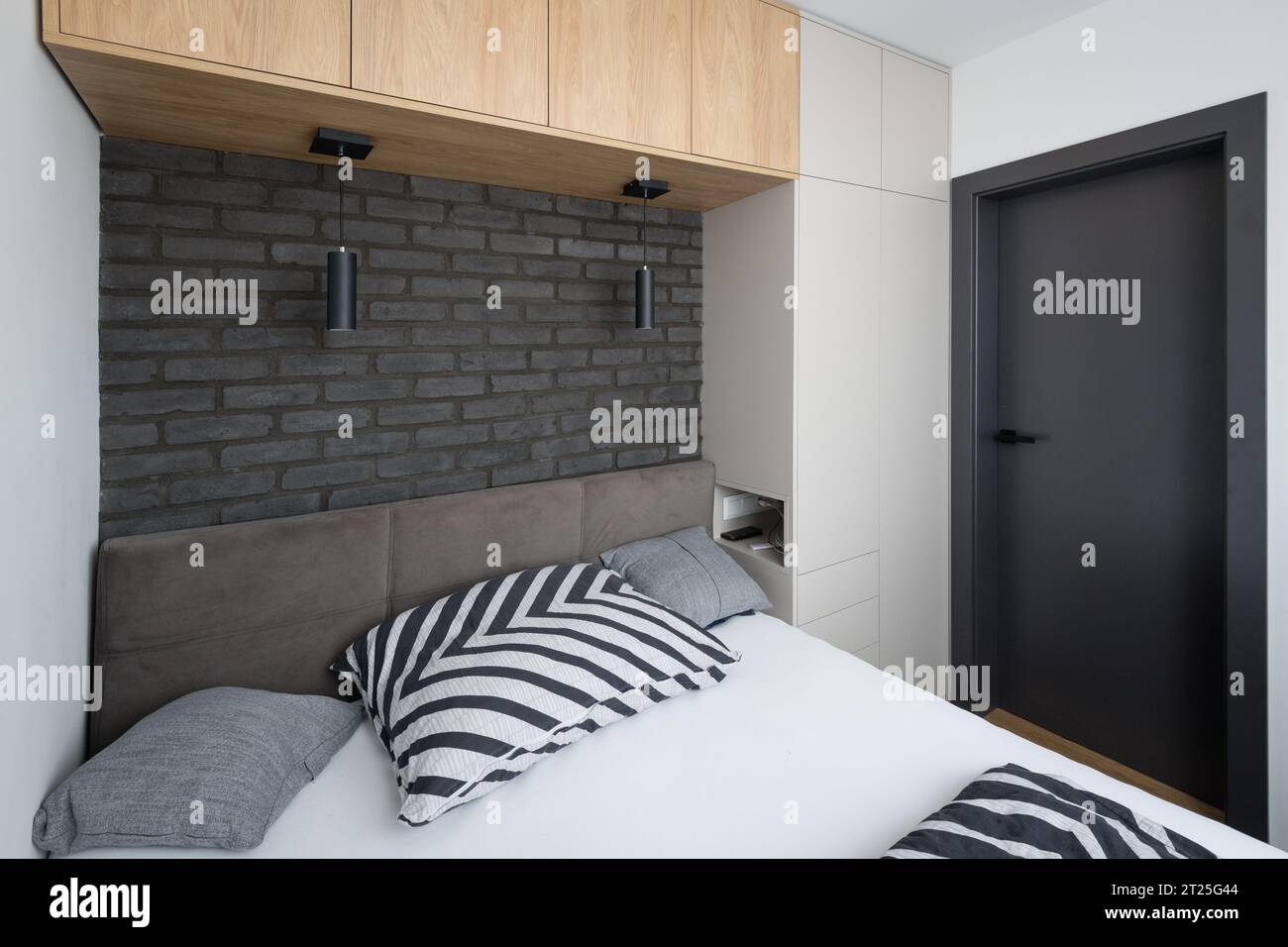 Small modern urban bedroom interior design Stock Photo - Alamy