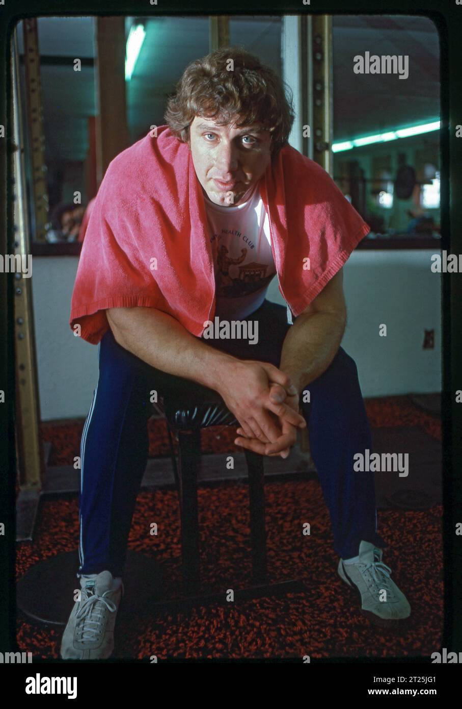 Four time olympic gold medalist Al Oerter cools off after a weight lifting workout at a gym in Long Island. He won his medals in the discuss throwing events and is one of the greatest Olympians in American history, Stock Photo