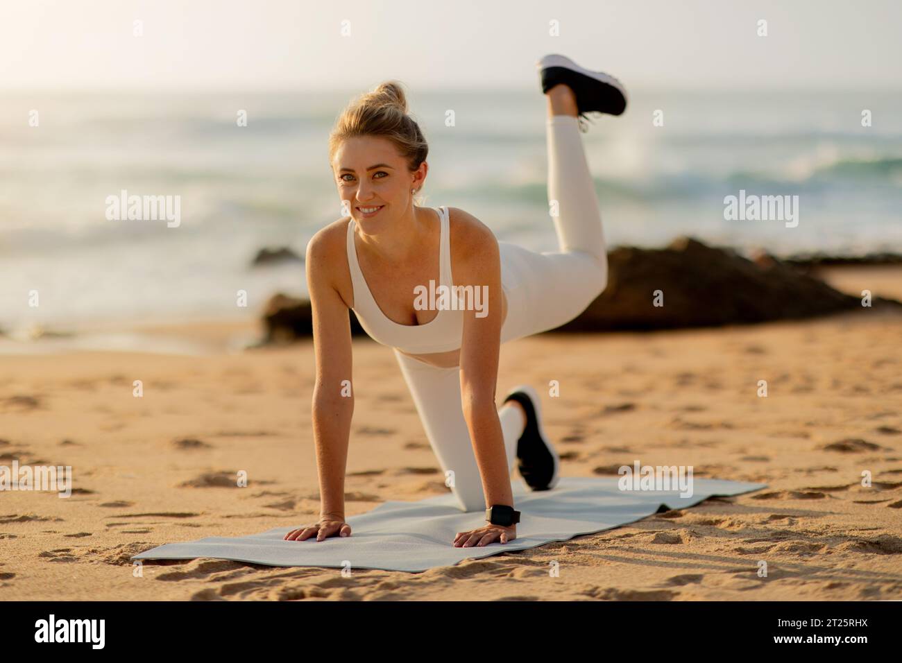 Woman Doing Exercises For Butts On Sunset Beach Stock Photo Alamy woman-doing-exercises-for-butts-on-sunset-beach-stock-photo-alamy
