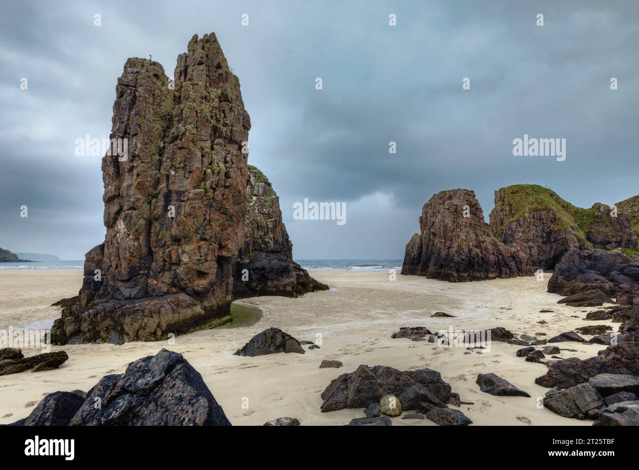 Garry Beach is a beautiful white sand beach with spectacular sea stacks and caves on the Isle of Lewis in the Outer Hebrides of Scotland. Stock Photo