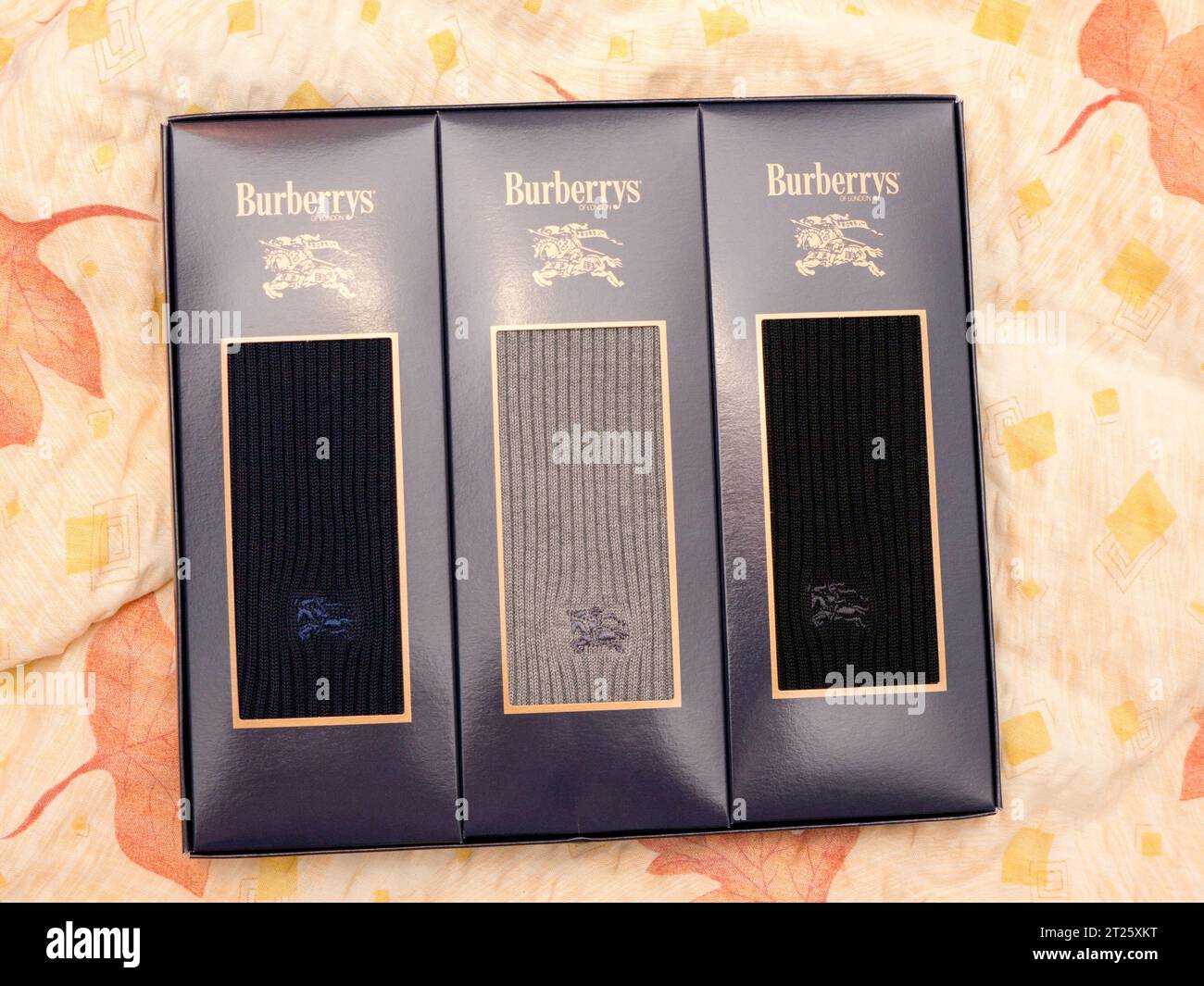 Burberrys socks. Burberry Group plc is a British luxury fashion house established in 1856 by Thomas Burberry and headquartered in London, England. Stock Photo