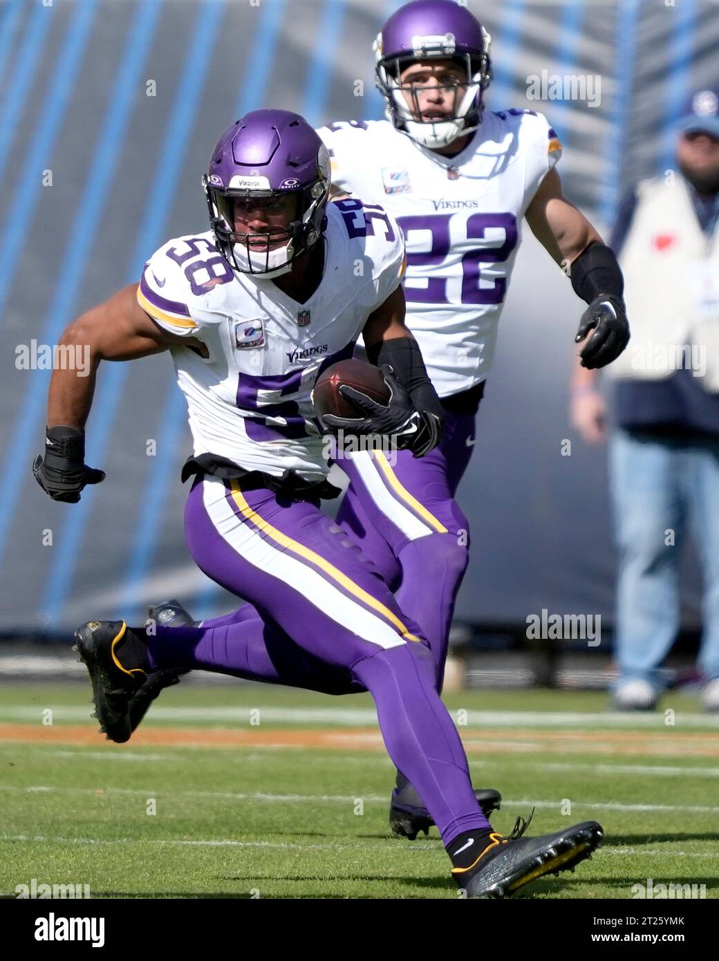 Minnesota Vikings Linebacker Jordan Hicks Returns His Interception Of A Minnesota Vikings Linebacker Jordan Hicks Returns His Interception Of A Chicago Bears Quarterback Justin Fields Pass As Safety Harrison Smith Follows During An Nfl Football Game Sunday Oct 15 2023 In Chicago Ap Photocharles Rex Arbogast 2T25YMK