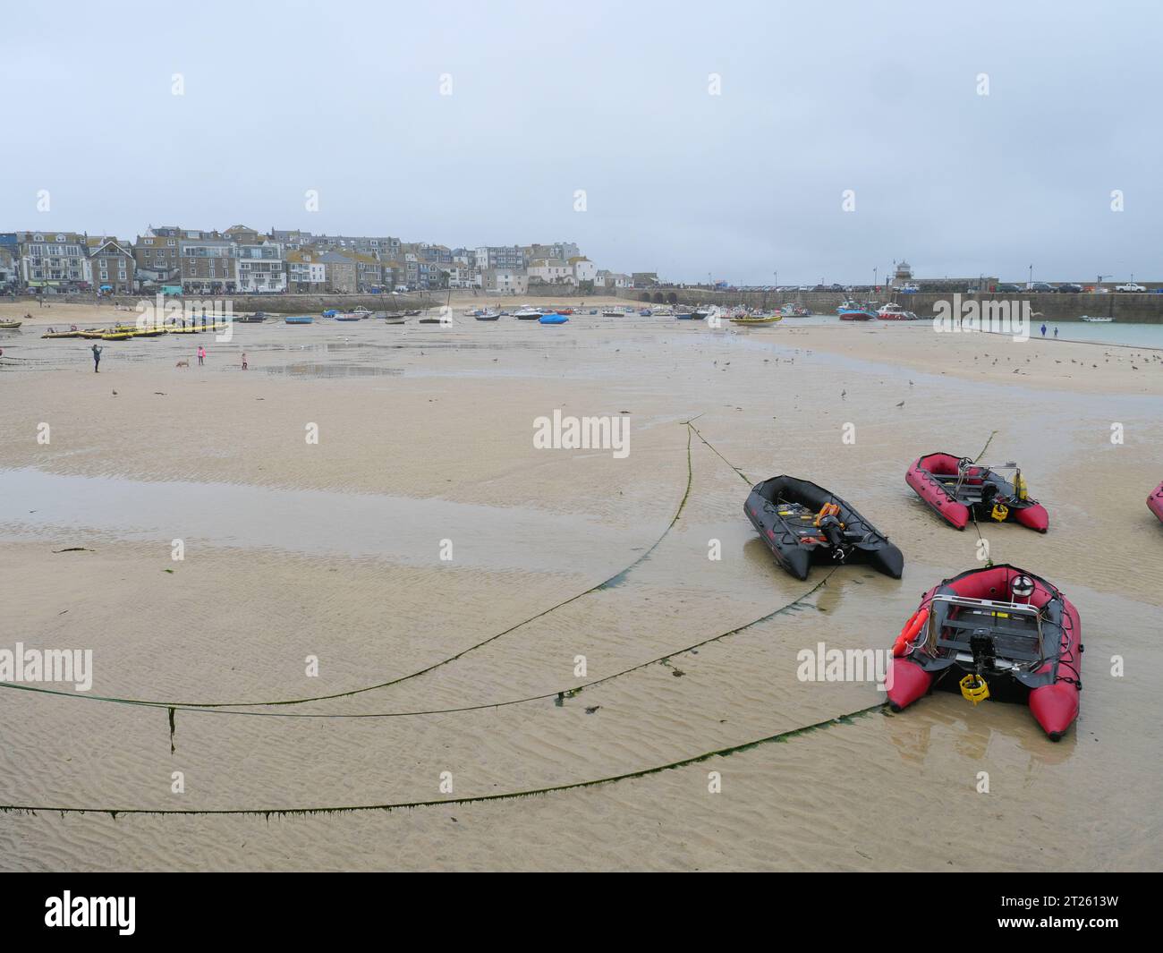 Inflatable rubber fishing boat on sandy beach near sea Stock Photo - Alamy