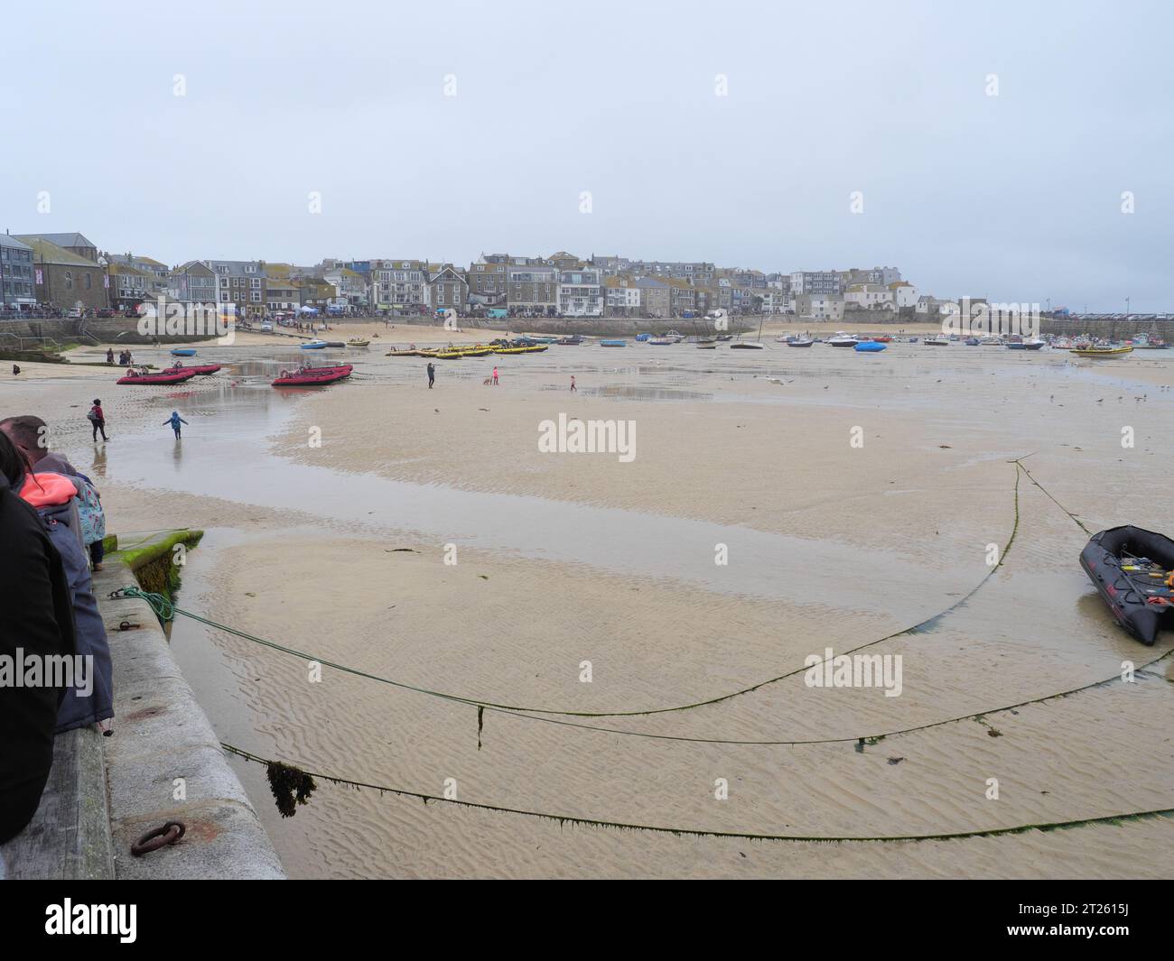 View of the sandy bottom of the harbor of St Ives in Cornwall England at low tide Stock Photo