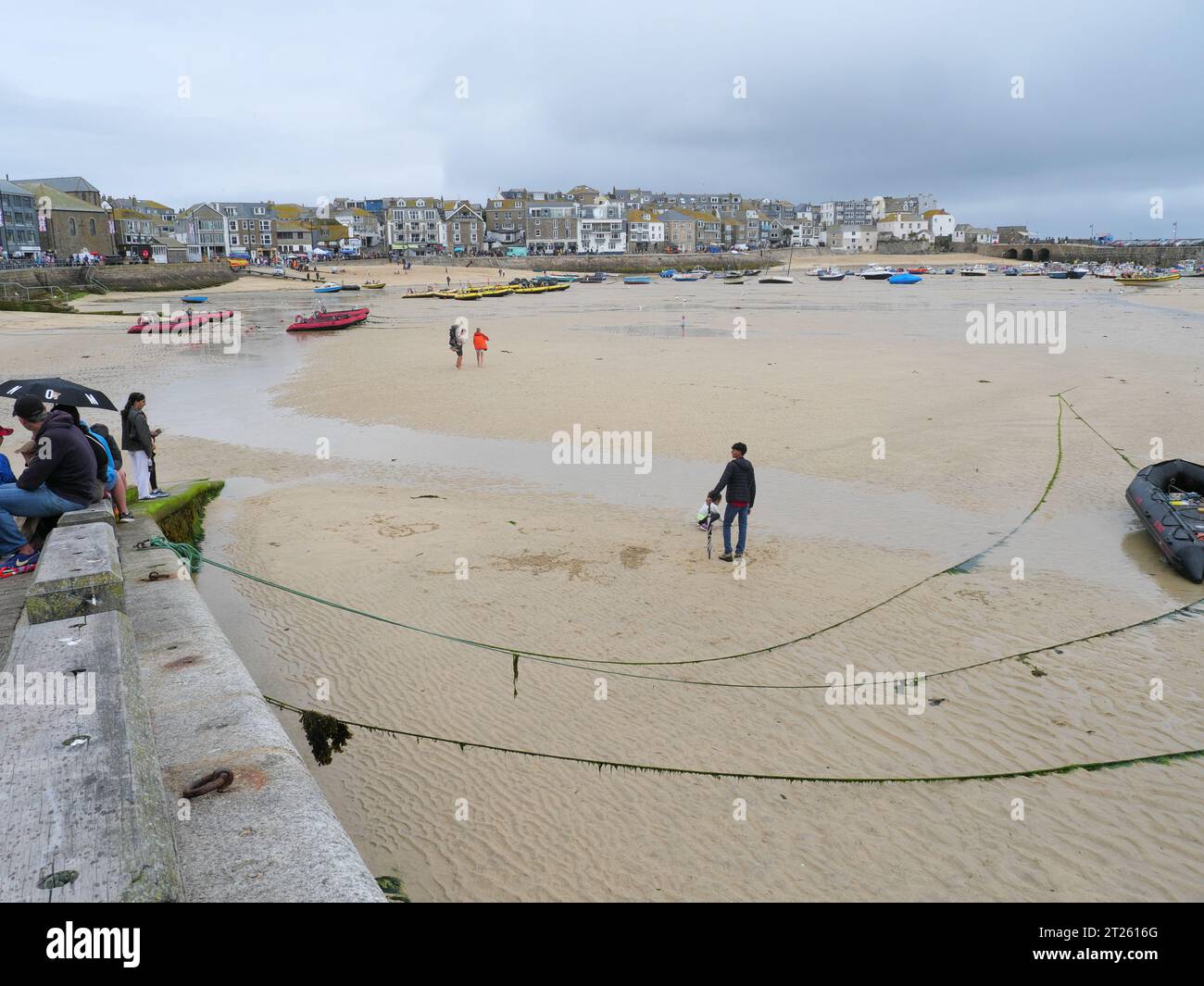 View of the sandy bottom of the harbor of St Ives in Cornwall England at low tide Stock Photo