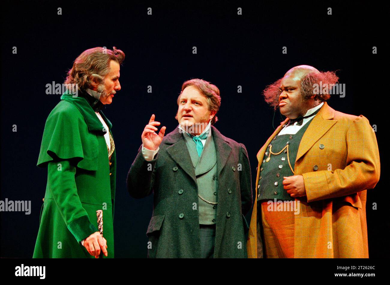 l-r: Oliver Cotton (Lord Glossmore), Simon Russell Beale (Alfred Evelyn), Clive Rowe (Stout) in MONEY by Edward Bulwer-Lytton at the Olivier Theatre, National Theatre (NT), London SE1  03/06/1999  music: Jonathan Dove  design: Rob Howell  lighting: Peter Mumford  movement: Jane Gibson  director: John Caird Stock Photo