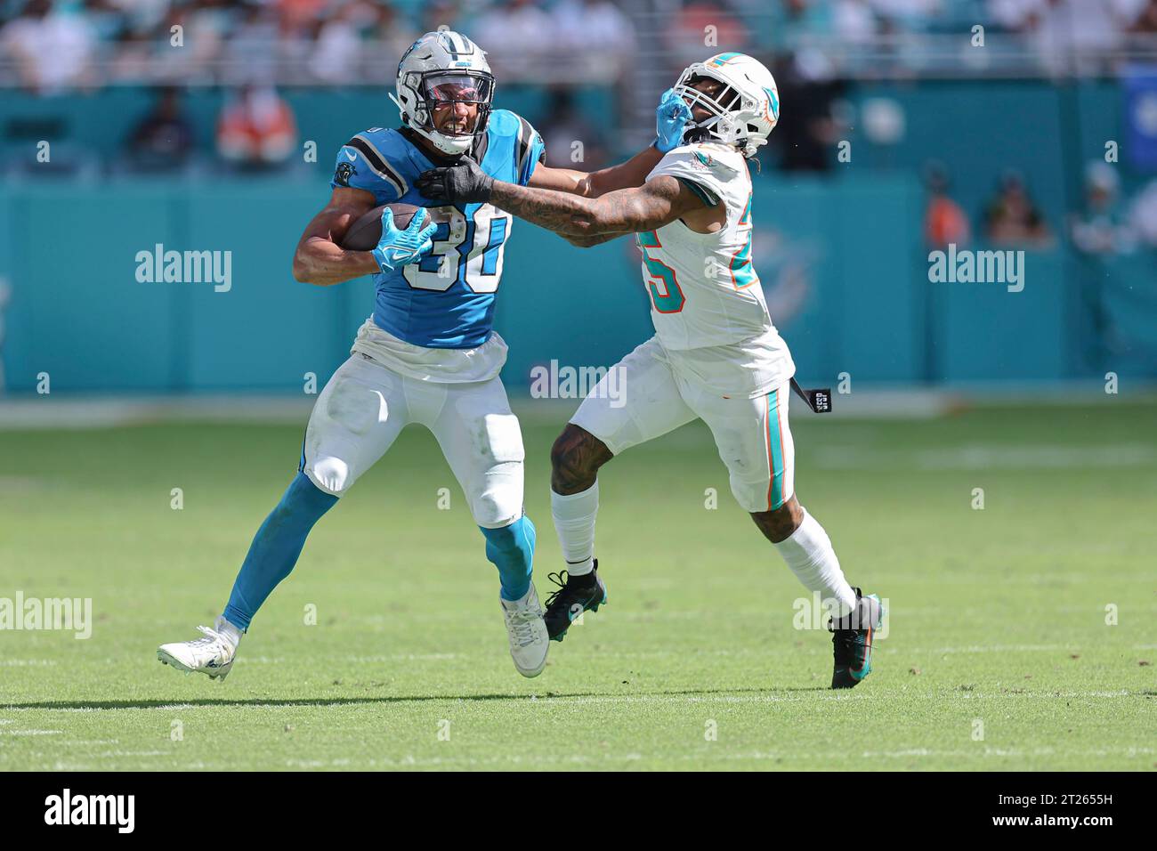 Miami. FL USA; Carolina Panthers running back Chuba Hubbard (30) runs