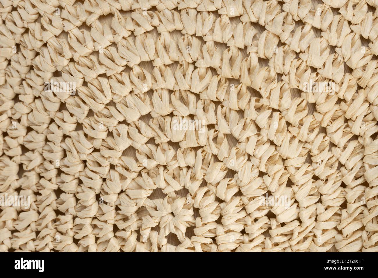 Round mesh beige sennit background close up view Stock Photo