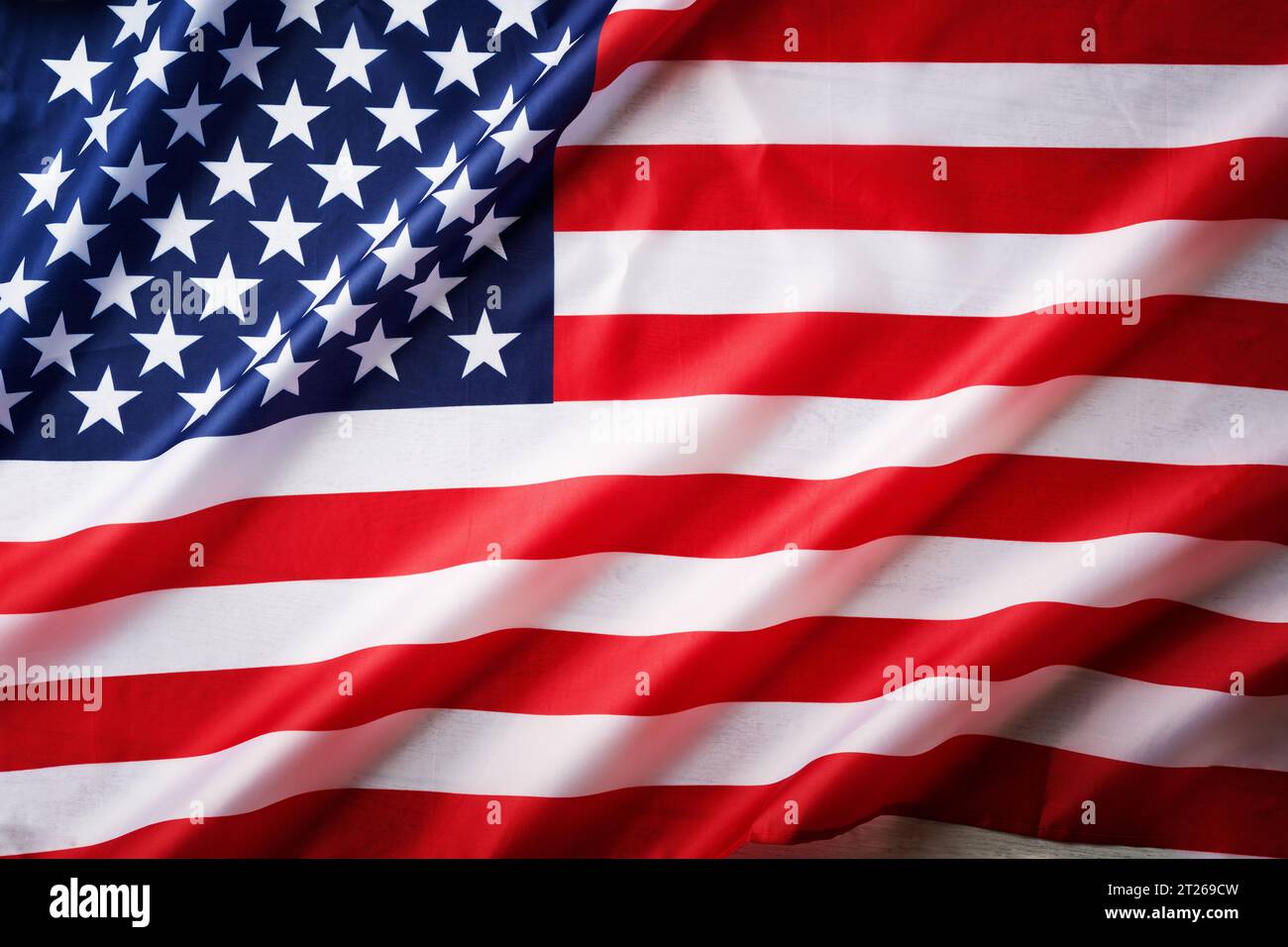 American USA flag. Beautifully waving wave American flag. National pride of United States America. Memorial, President, Labor Day background. Patrioti Stock Photo