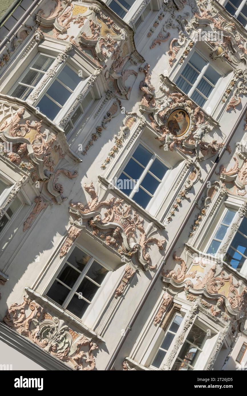 Austria, Tyrol, Innsbruck, Altstadt, Helbling House or Helblinghaus, detail of facade with Rococo stucco decorations dating from 1732. Stock Photo