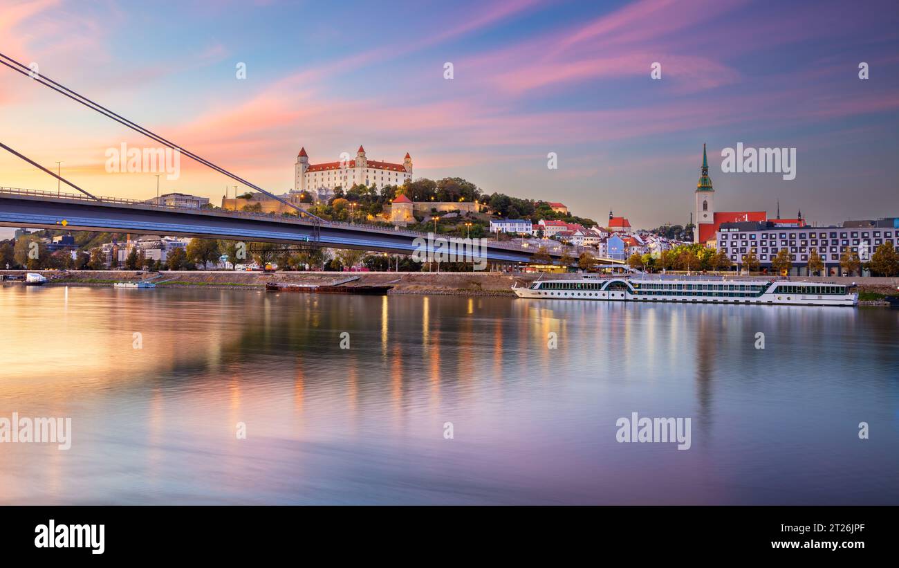 Bratislava, Slovakia. Cityscape image of Bratislava, capital city of Slovakia during beautiful autumn sunset. Stock Photo