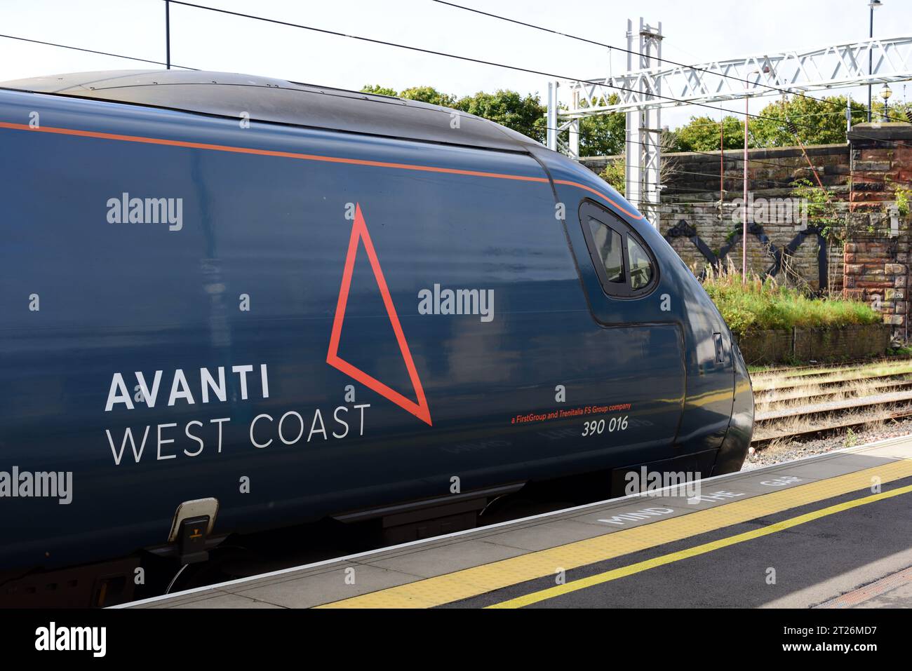 Avanti West Coast train 1S48 the 0930 Euston to Glasgow leaving Carlisle with power car 390016. Stock Photo