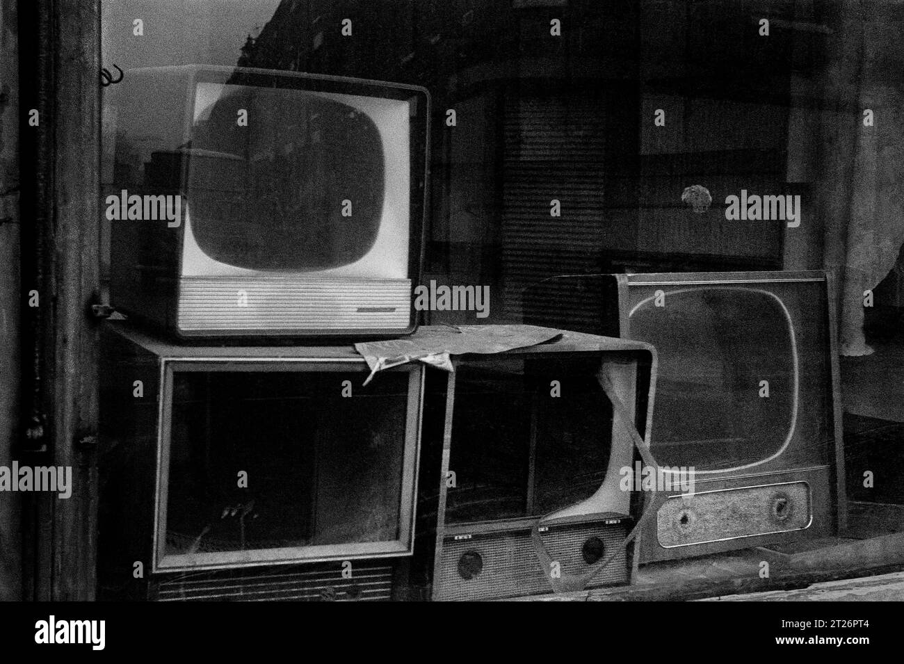 Empty shop with old television carcases in the window. Photo taken during the demolition of St Ann's between 1969-1972, Nottingham, Nottinghamshire, E Stock Photo