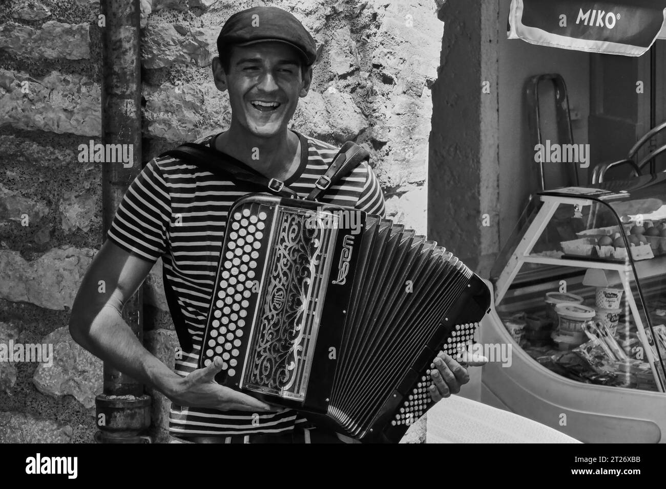 Local characters playing the accordion in the old town of Antibes