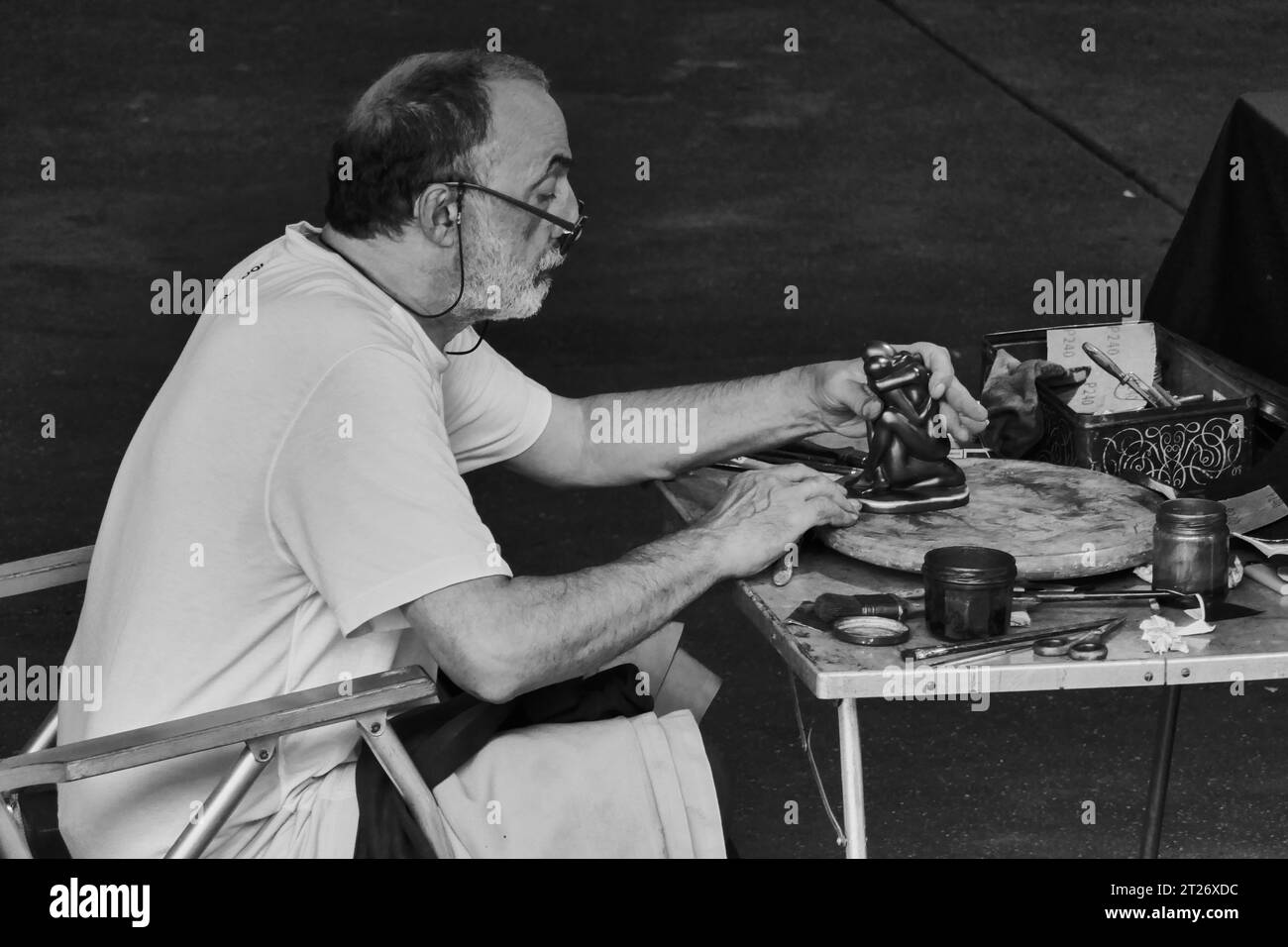 Local character making statuettes in the marche provencal of Antibes