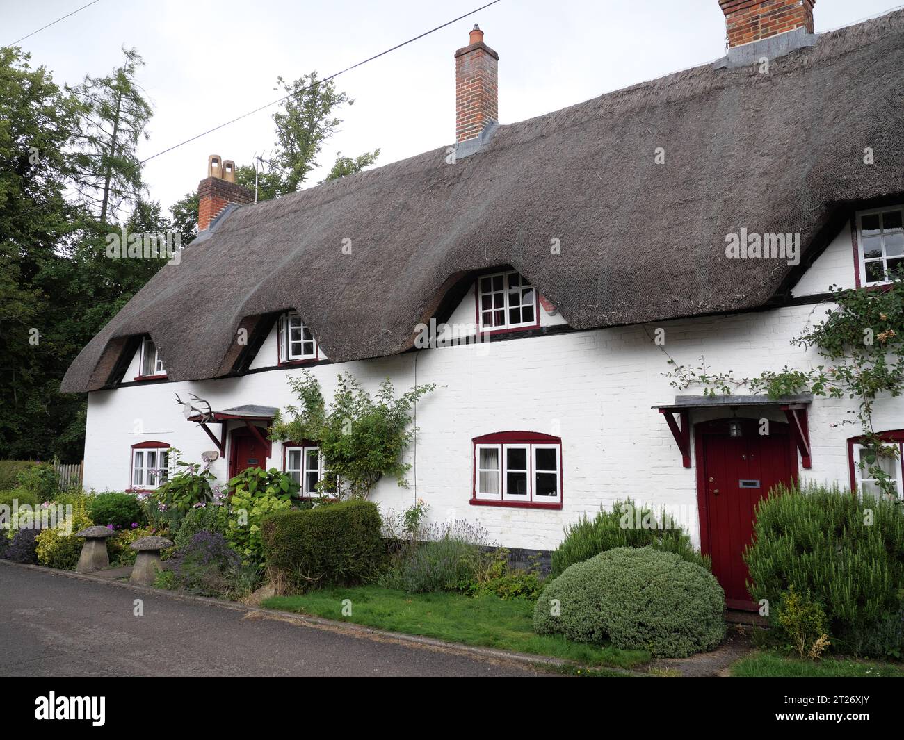 Thatched roofs of old houses in Wherwell England Stock Photo