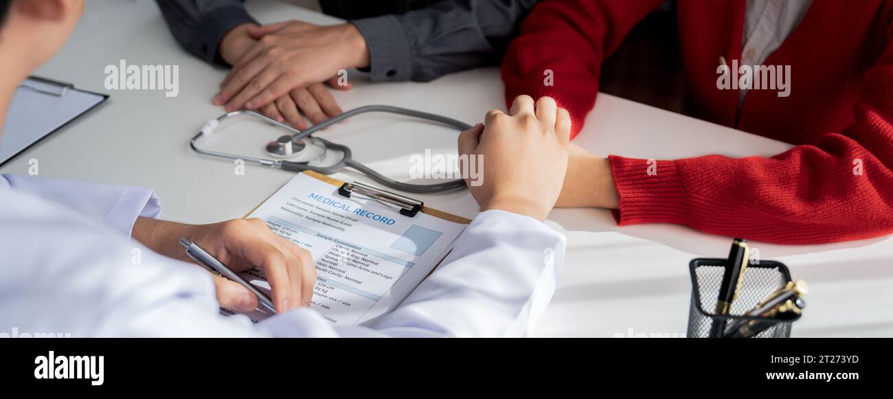 Couple attend fertility or medical consultation with gynecologist at hospital as family planning