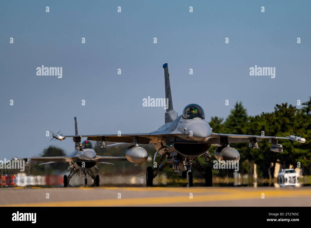 Gunsan, South Korea. 16th Oct, 2023. Two U.S. Air Force F-16C Fighting Falcon fighter aircraft assigned to the Wolf Pack of the 35th Fighting Squadron taxi after landing at Kunsan Air Base, October 16, 2023 in Gunsan, South Korea. Credit: SrA Karla Parra/U.S Air Force/Alamy Live News Stock Photo
