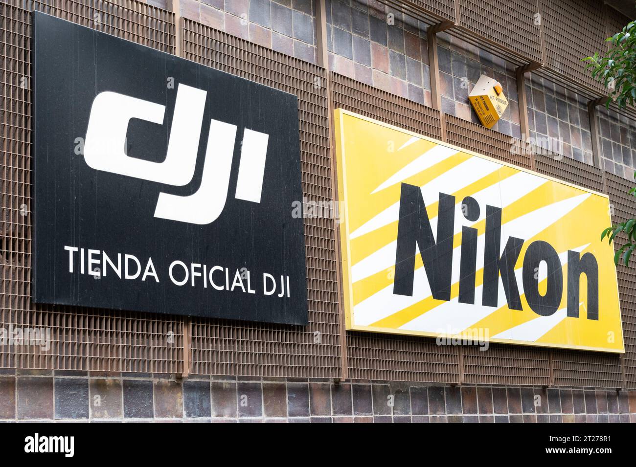 Madrid, Spain. 16th Oct, 2023. Japanese multinational electronics  corporation and manufacturer, Nikon, and Chinese technology drone company,  DJI, logos seen outside their official store in Spain. (Photo by Xavi  Lopez/SOPA Images/Sipa USA)