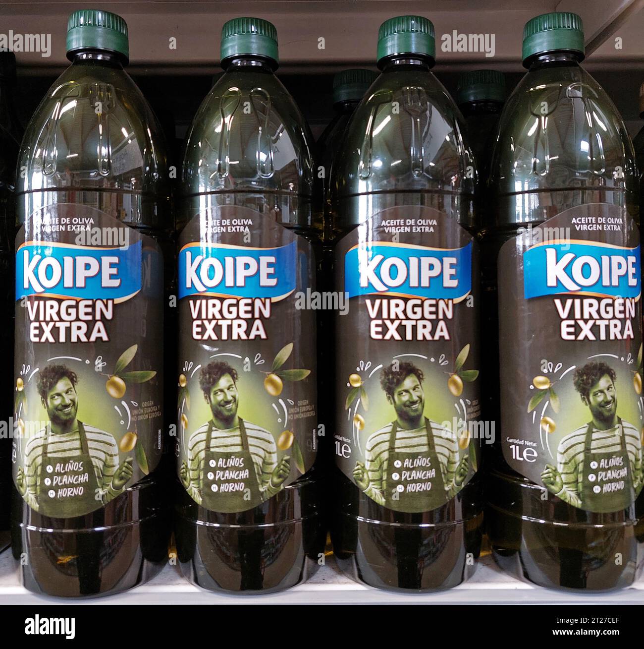 spanish virgen extra Koipe olive oil bottles in a supermarket Stock Photo