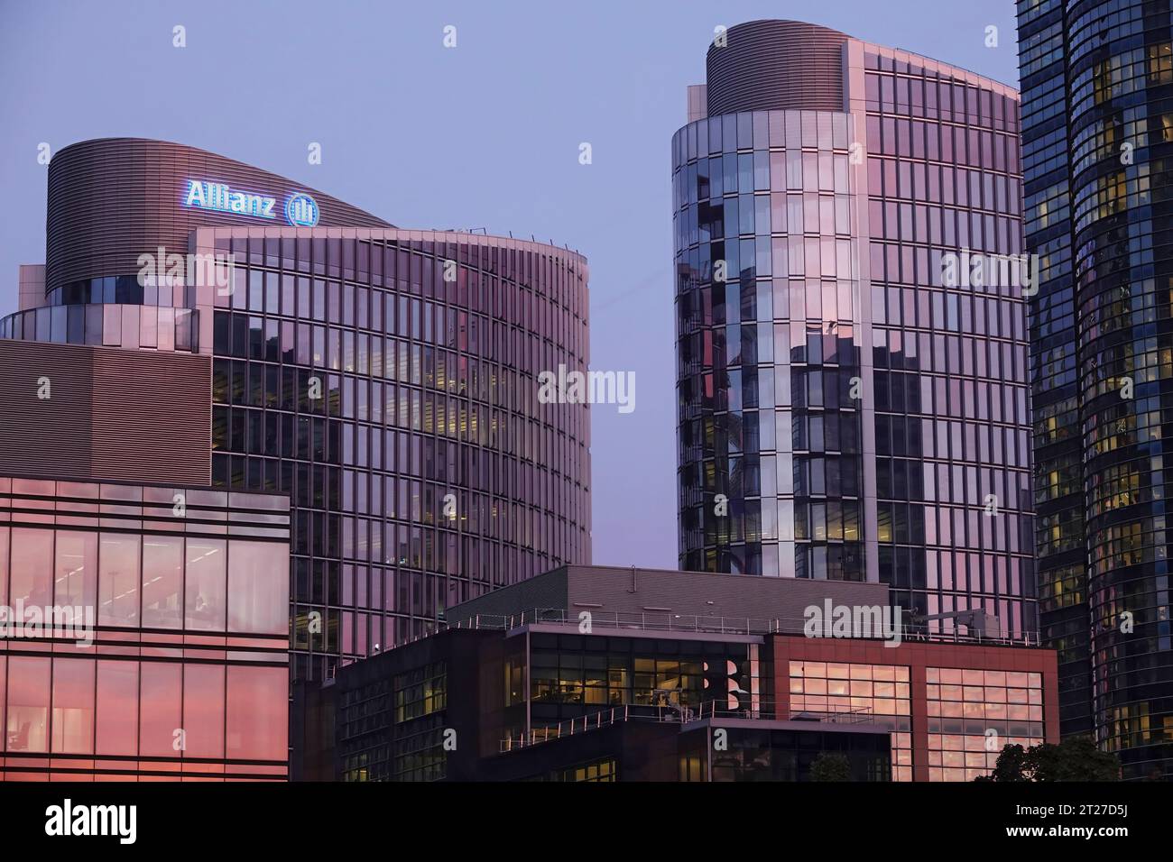 Evening view on the modern round-shaped Allianz insurer Headquarter skyscraper in Brussels north Business center Stock Photo