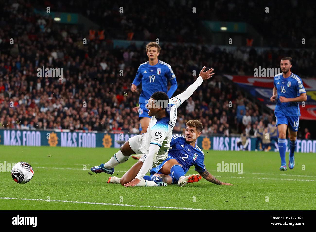 London, UK. 17th Oct, 2023. Jude Bellingham of England is brought down in penalty area by Giovanni Di Lorenzo of Italy and a penalty is awarded after VAR check. England v Italy, UEFA Euro 2024 qualifier International football group C match at Wembley Stadium in London on Tuesday 17th October 2023. Editorial use only. pic by Andrew Orchard/Andrew Orchard sports photography/Alamy Live News Credit: Andrew Orchard sports photography/Alamy Live News Stock Photo