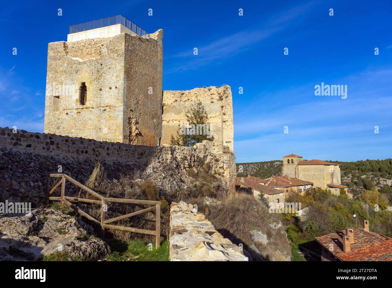 View of the castle and the church of the medieval village of Calatañazor in a sunny day, Soria, Castilla y Leo Stock Photo