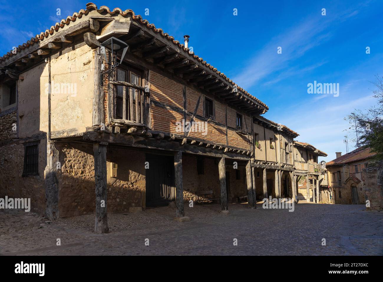 View of the traditional houses of the medieval village of Calatañazor in a sunny day, Soria, Castilla y Leon, Stock Photo