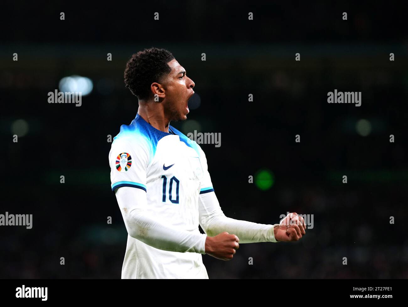 England's Jude Bellingham celebrates after team-mate Marcus Rashford ...