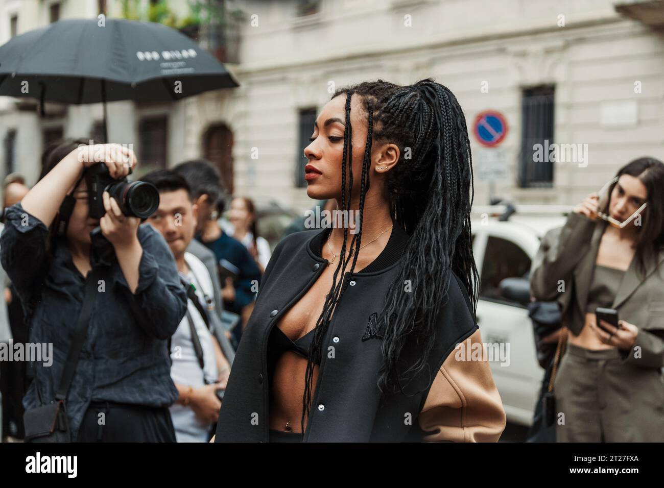 Coco Rebecca Edogamhe wears all Max Mara, outside MAX MARA show during