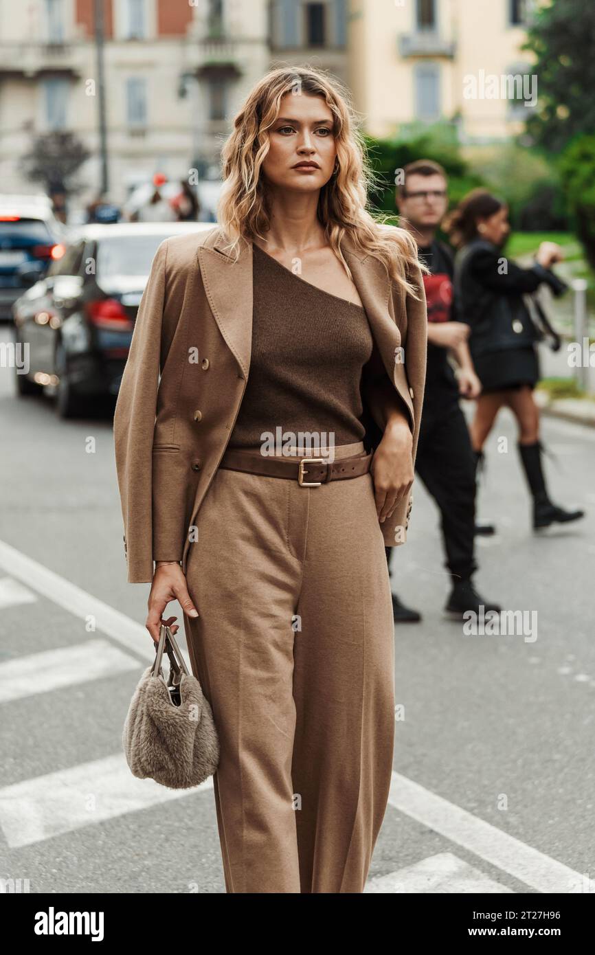 Chloe Lecareux wears all Max Mara outside MAX MARA show during Milan Fashion Week Womenswear Spring/Summer 2024. Stock Photo