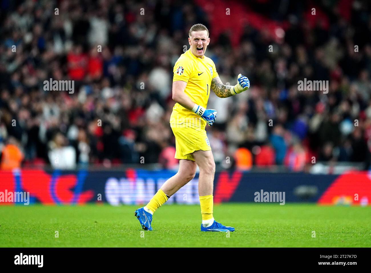 England goalkeeper Jordan Pickford celebrates victory and qualifying ...