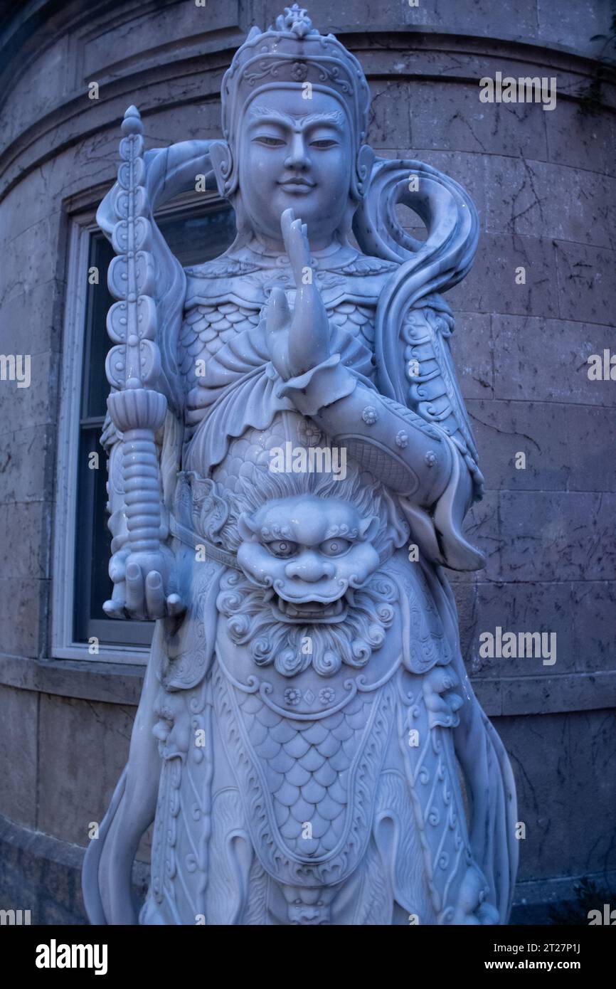 buddha statue in nyc brooklyn park slope Stock Photo - Alamy