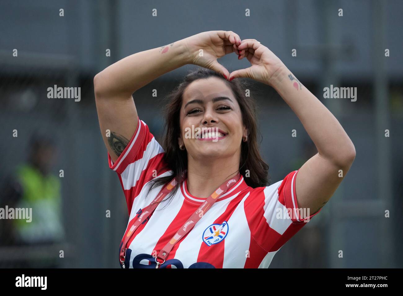 Model Larissa Riquelme poses for a photo before a qualifying soccer match for the FIFA World Cup 2026, between Paraguay and Bolivia at Defensores del Chaco Stadium in Asuncion, Paraguay, Tuesday, Oct. 17, 2023. (AP Photo/Jorge Saenz) Stock Photo