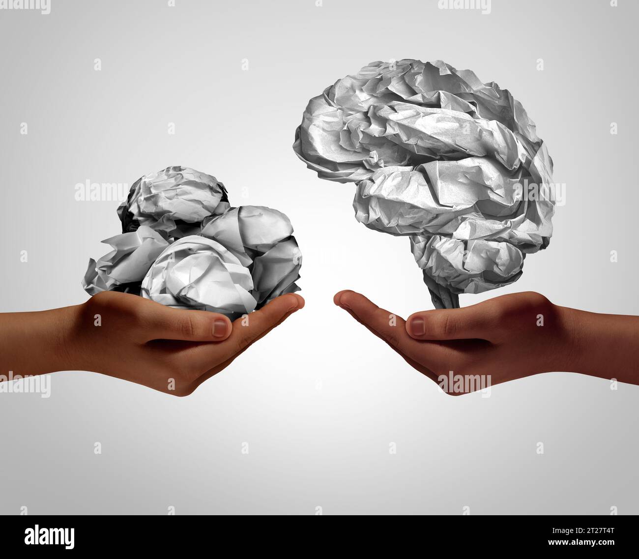 Chaos And Innovation as order and disorder concept as crumpled paper balls and a brain as a symbol for mental health therapy or management metaphor. Stock Photo