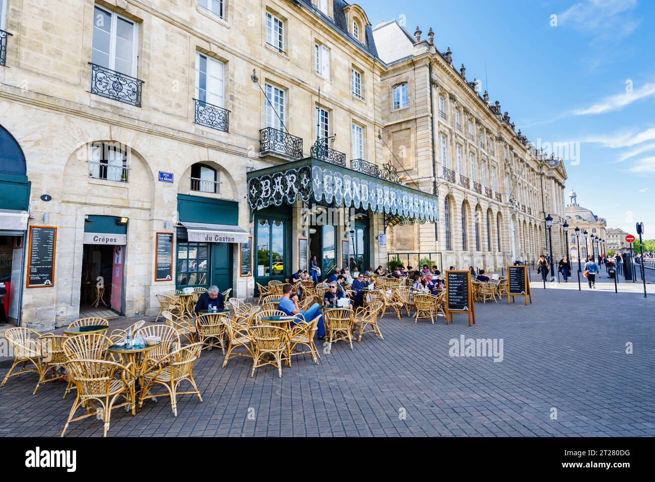 Outdoor dining outside the riverside Grand Bar Castan, one of the oldest cafes  in Bordeaux, a port city on the Garonne River in southwestern France Stock Photo