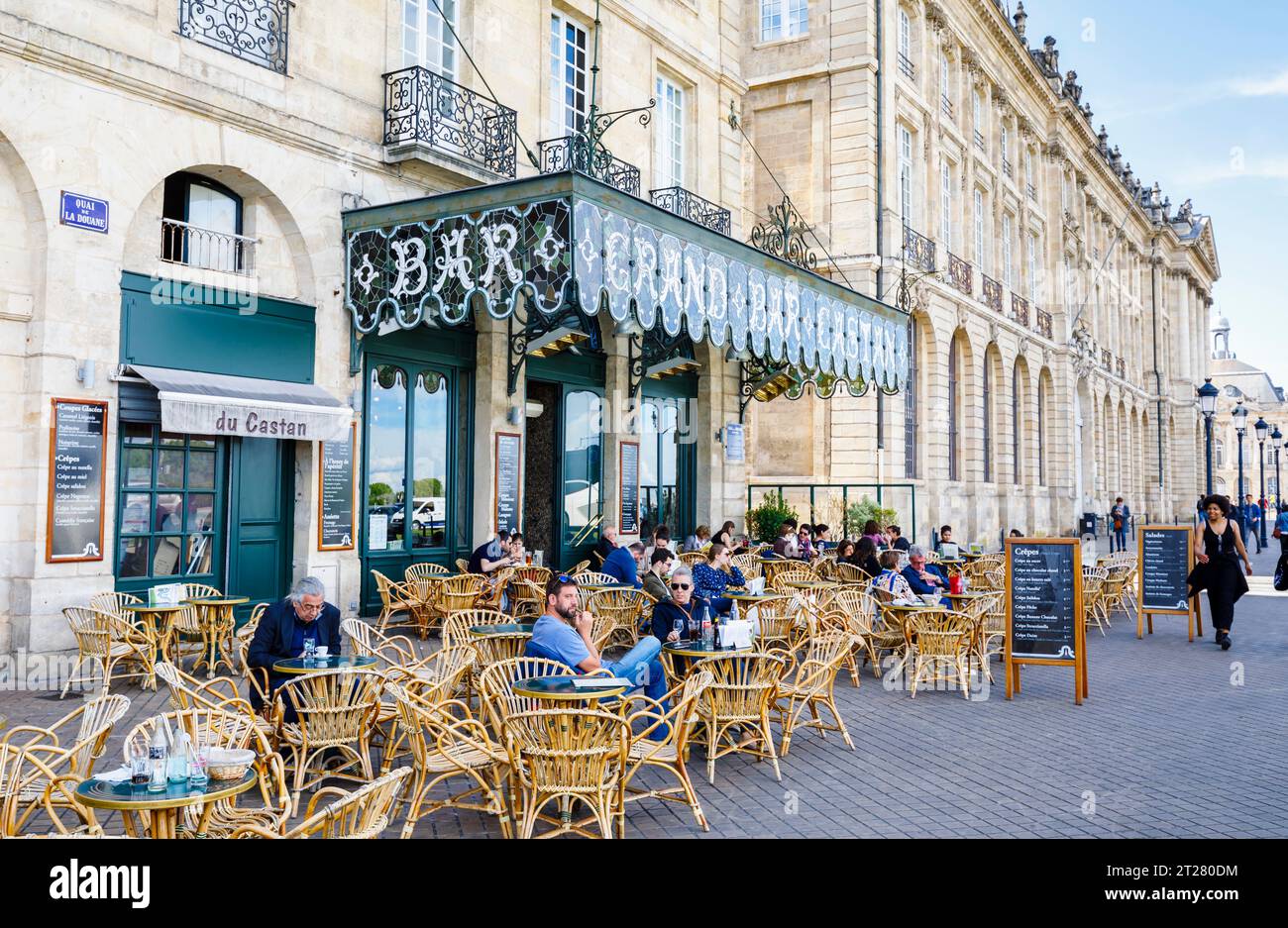 Outdoor dining outside the riverside Grand Bar Castan, one of the oldest cafes  in Bordeaux, a port city on the Garonne River in southwestern France Stock Photo
