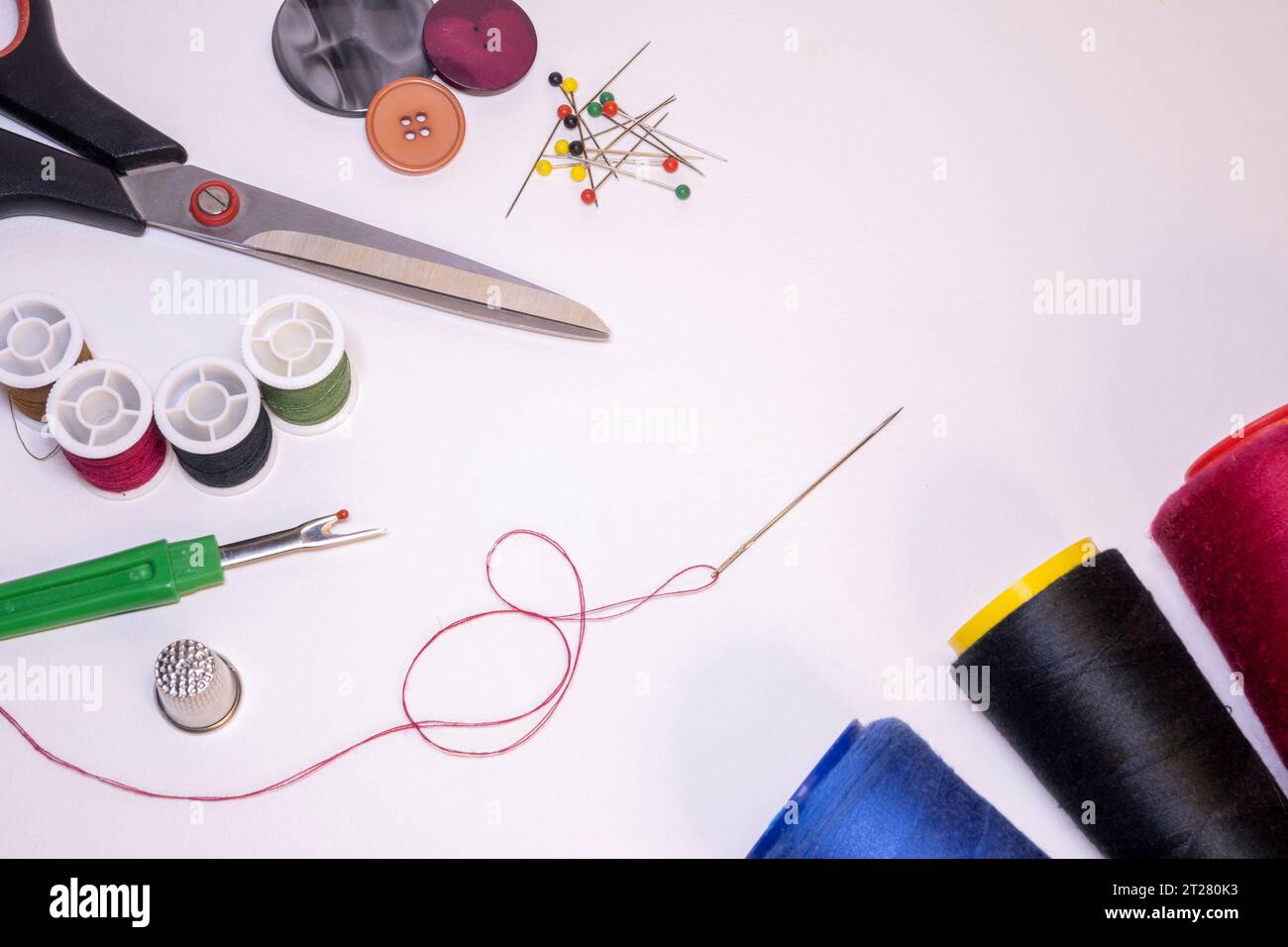 Sewing tools on a light background. Stock Photo