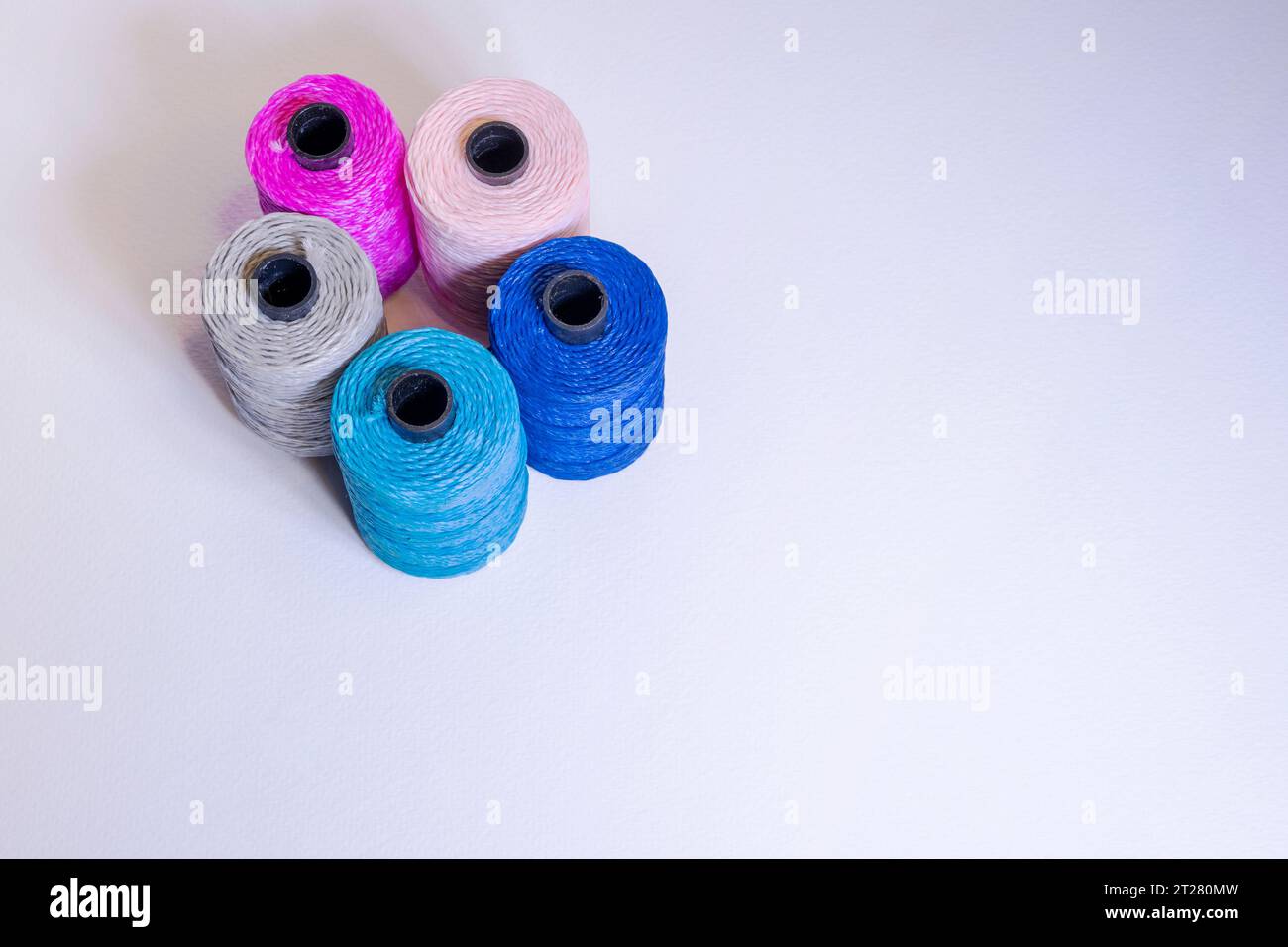 Large colorful threads on a light background. Stock Photo