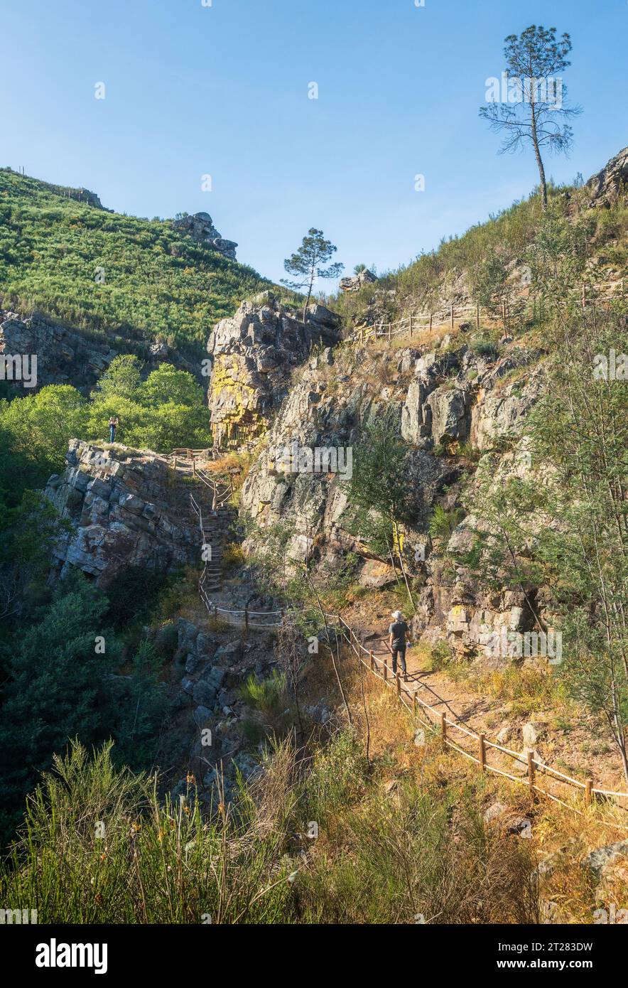 Landscape of the trail between the Penedo Furado waterfalls in Vila de Rei, Portugal, with its imposing rock formations. Stock Photo