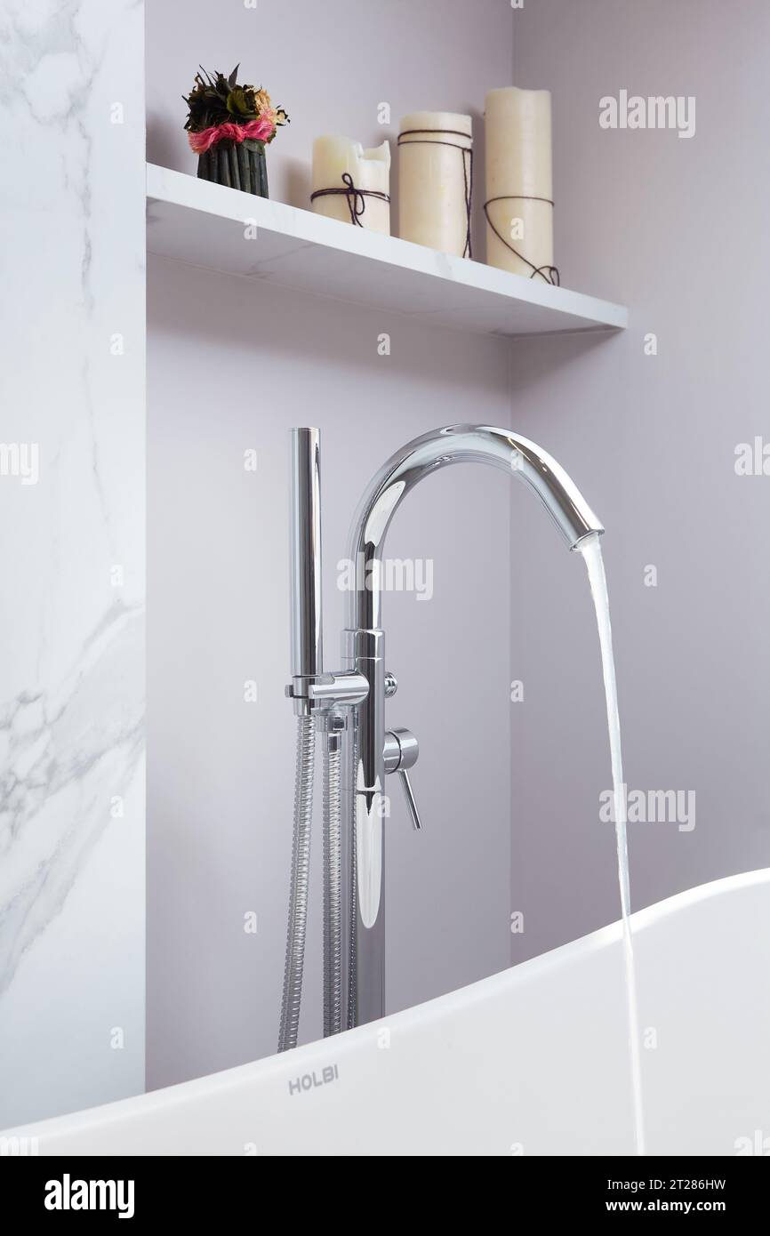 Bathroom water mixer. Water tap made of chrome material Stock Photo - Alamy
