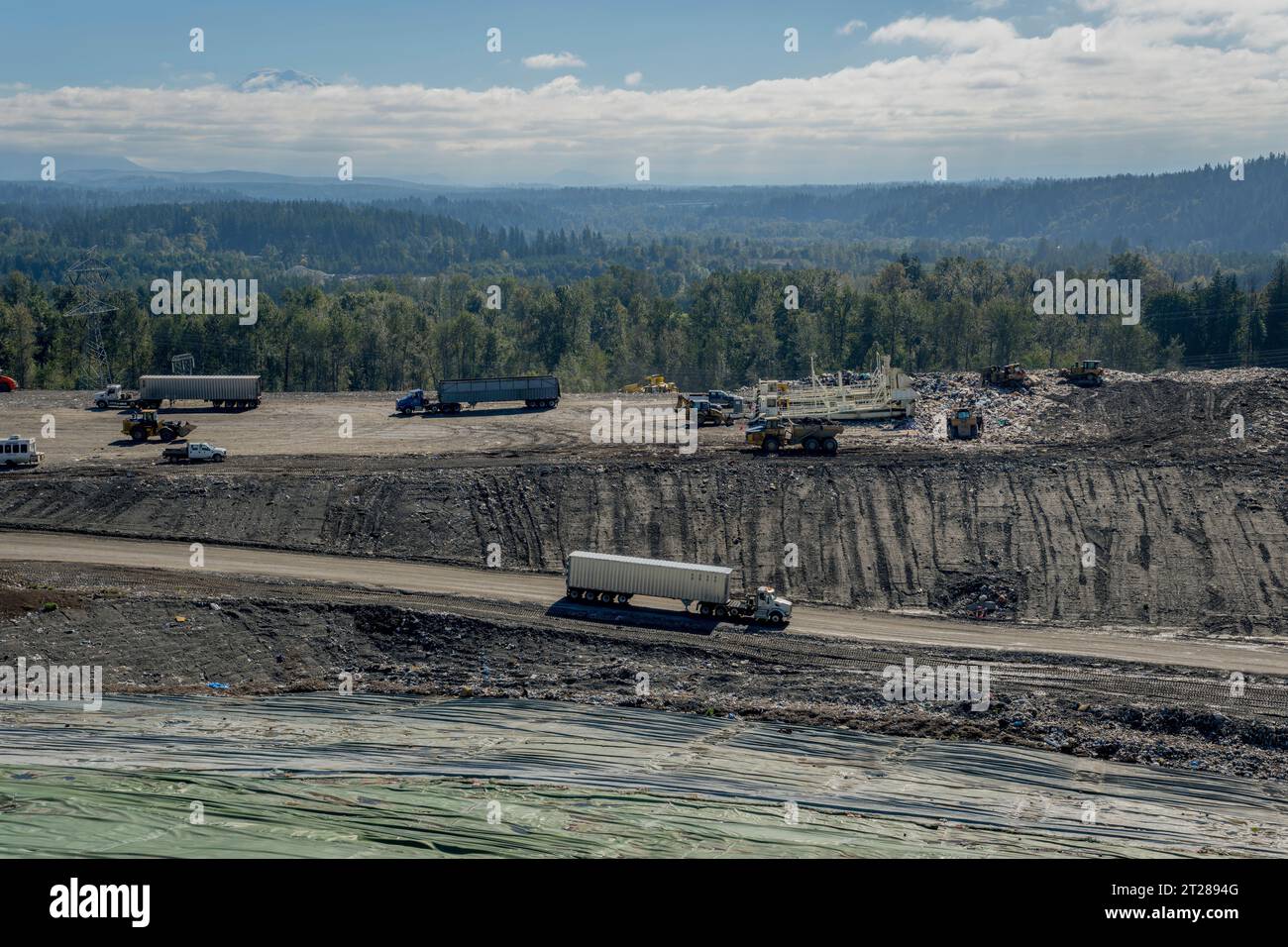 Trucks with garbage from transfer stations at the King County Cedar