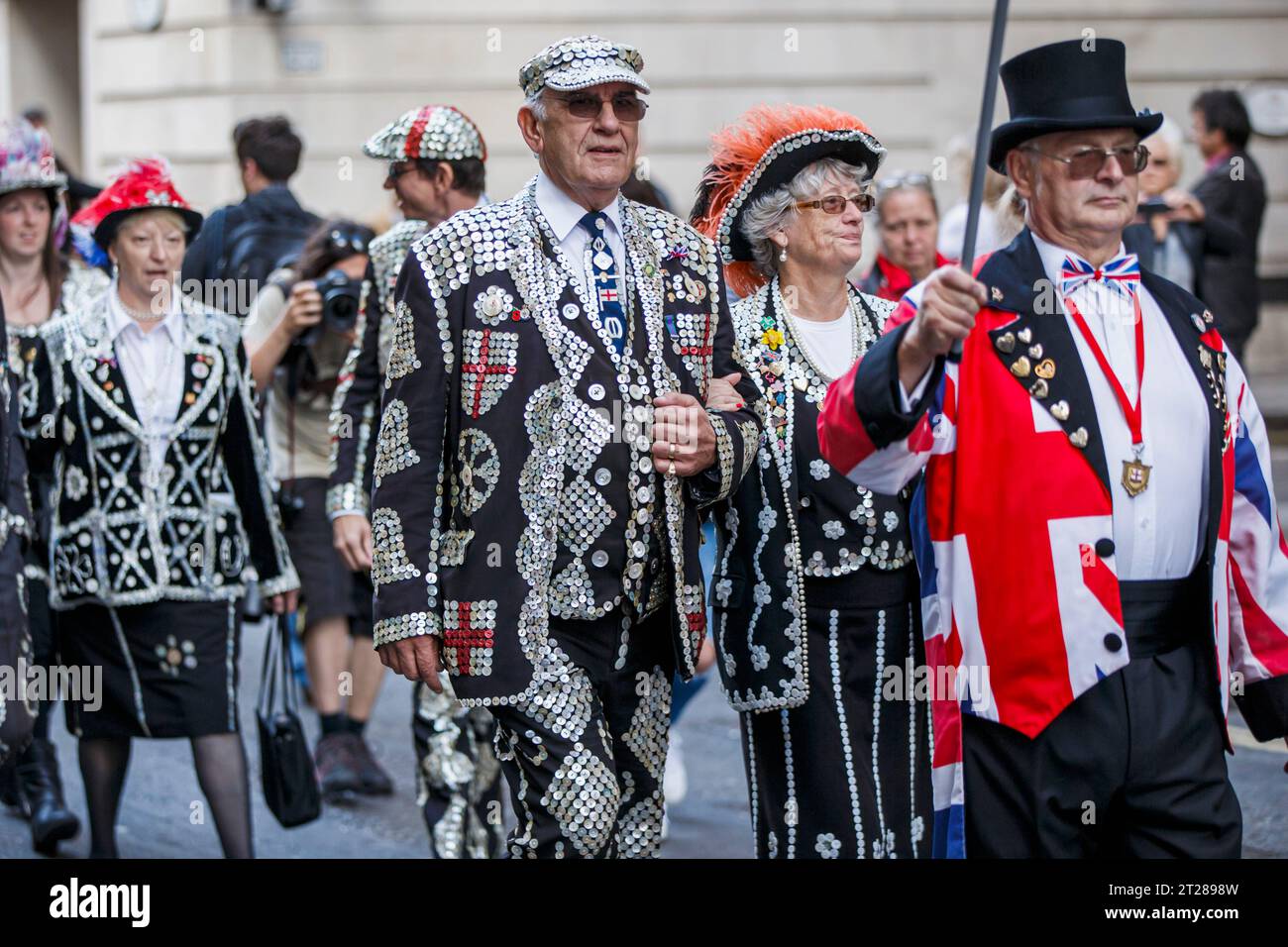 Pearly Kings and Queens at the Pearly Kings and Queens Harvest Festival at Guildhall Yard, London, England. Stock Photo
