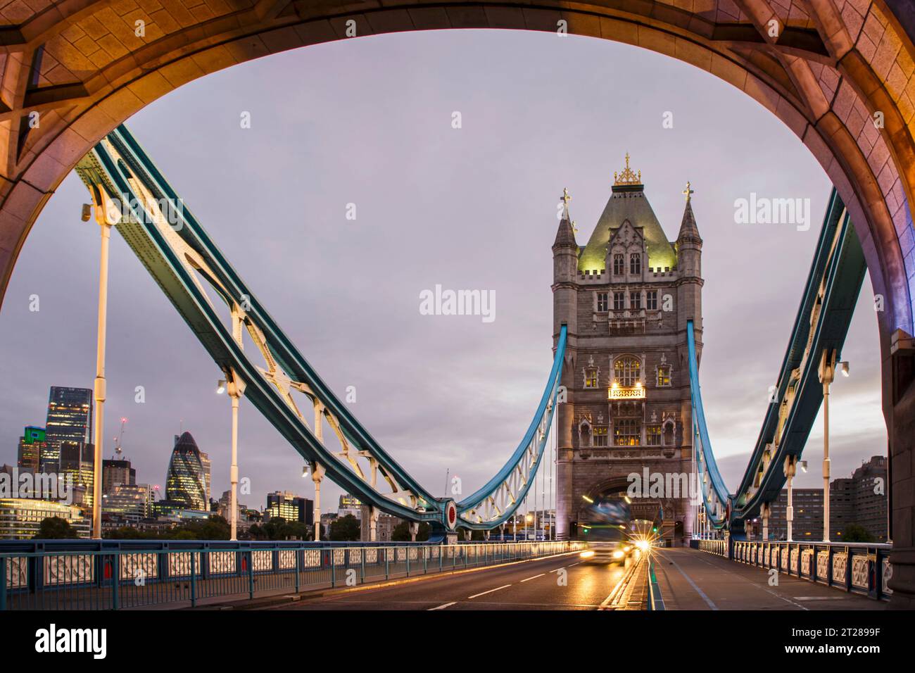 Traffic on Tower Bridge at dawn illuminated in London, United Kingdom Stock Photo