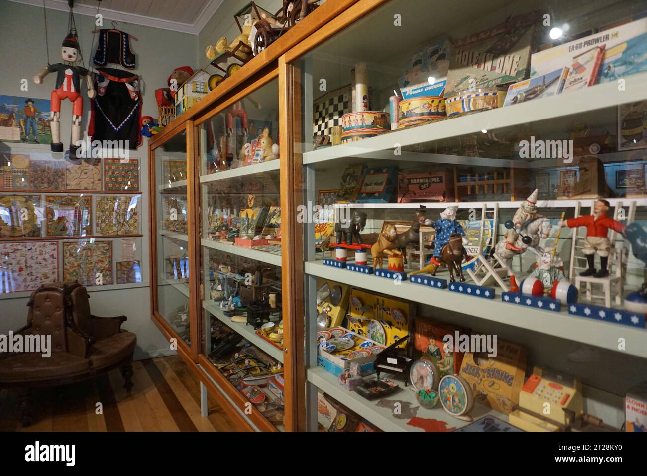 Display of old fashioned wooden toys and games in toy store in historic