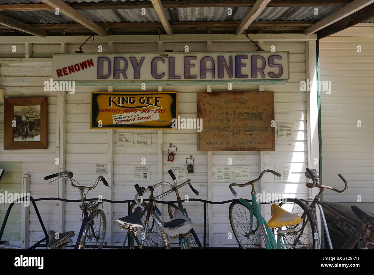 Exterior of dry cleaners with old fashioned bikes in front in